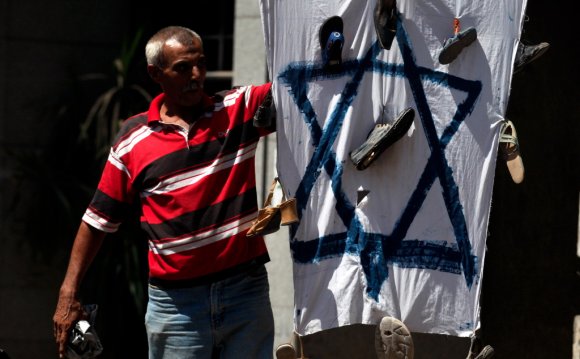 A demonstrator holds an