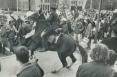 A Toronto mounted police officer is surrounded by demonstrators protesting the Vietnam War outside the U.S. consulate on University Ave. in 1968