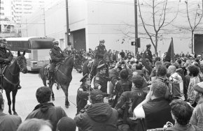 Citation: Mounted police with WTO protestors, November 29, 1999. Unprocessed Image Bank Negatives, Binder 90330, Sheet 991206.02 #21. Seattle Municipal Archives.