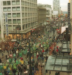 Citation: Protest march on Pine Street, November 29, 1999. Unprocessed Image Bank Negatives, Binder 990909-20000330, Sheet 19991129.01 #36. Seattle Municipal Archives.