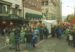 Citation: WTO Protestors marching, November 29, 1999. Unprocessed Image Bank Negatives, Binder 990909-20000330, Sheet 19991129.01 #29. Seattle Municipal Archives.