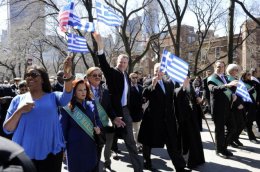 (L-R) Public Advocate Letitia James (in blue), Mayor Bill de Blasio, Chuck Schumer, and, Gov. Andrew Cuomo (right, with flag) walk in the Greek Independence Day Parade March 29, 2015.