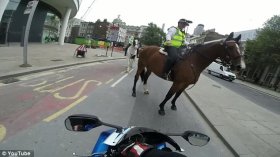 The unsuspecting driver is told to switch off his engine before being given a stern talking-to by the police